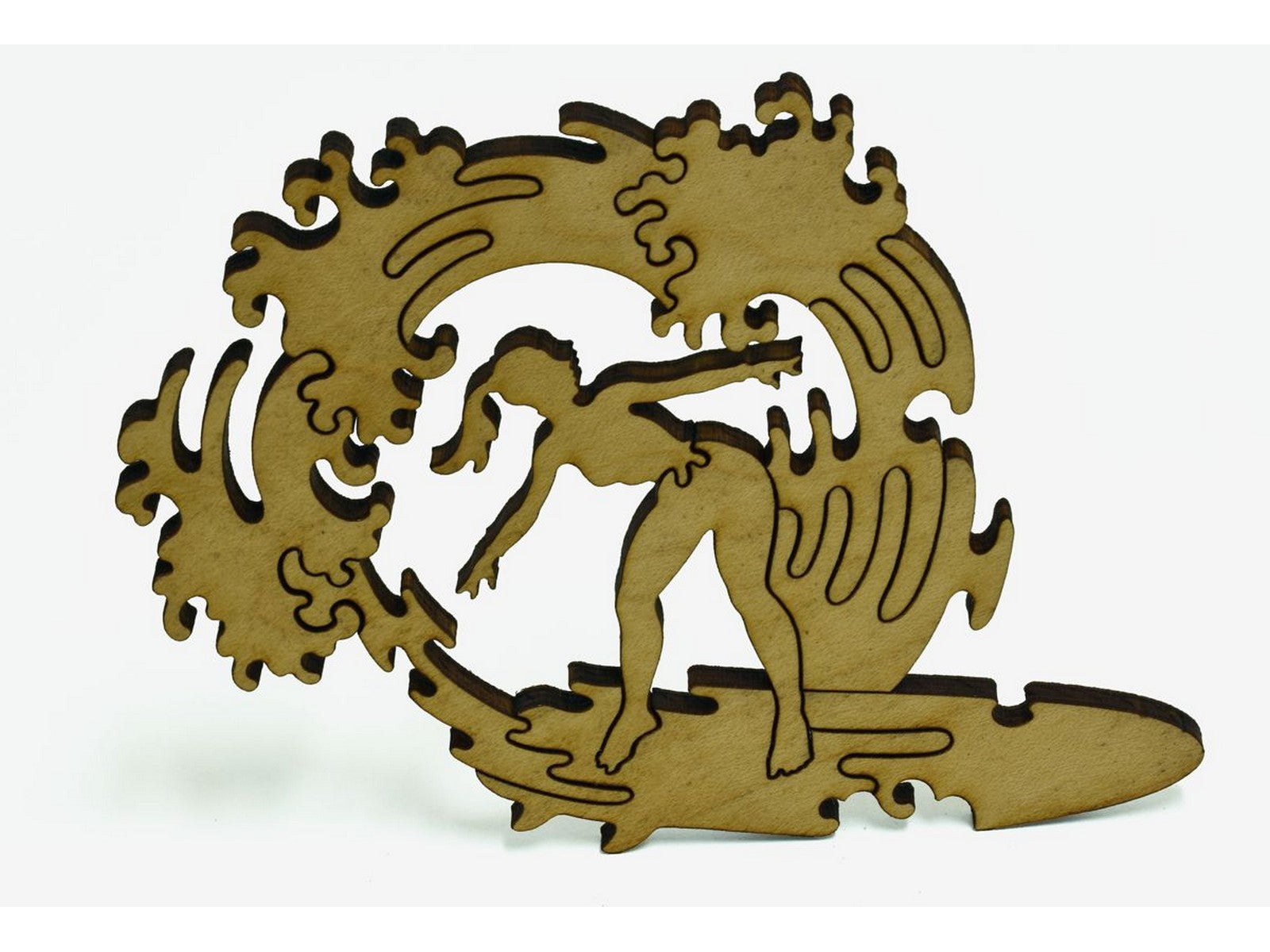 A closeup of pieces shaped like a woman surfing.