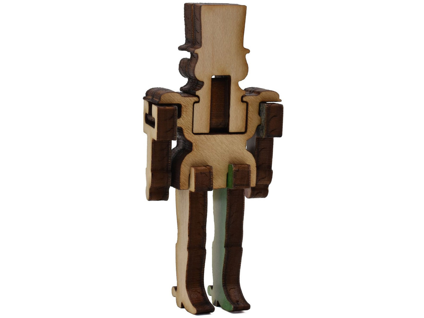 A closeup of pieces shaped like a three dimensional nutcracker.