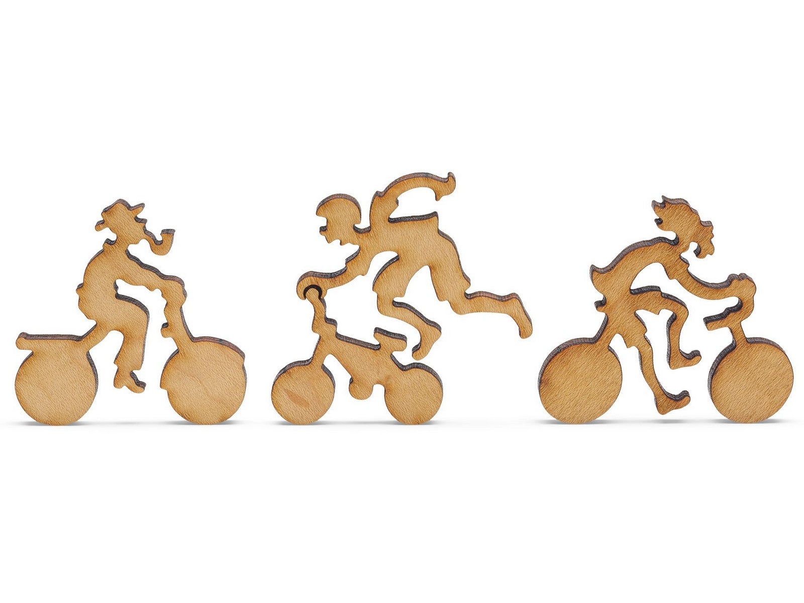 A closeup of pieces shaped like three people riding bicycles.