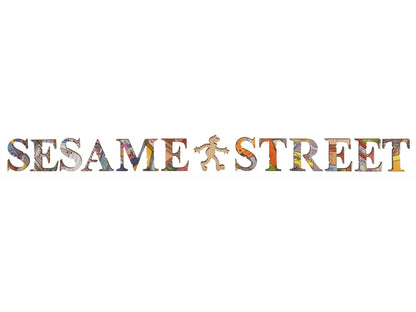 A closeup of pieces shaped like the letter spelling out the title, Sesame Street, and Elmo.