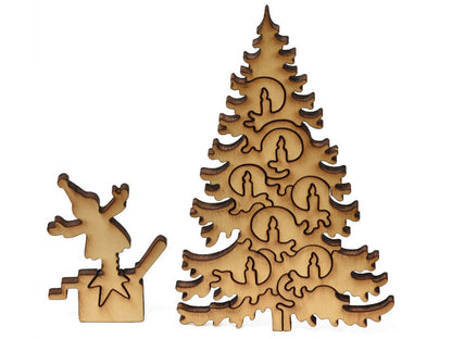 A closeup of pieces showing a jack in the box and a Christmas tree.