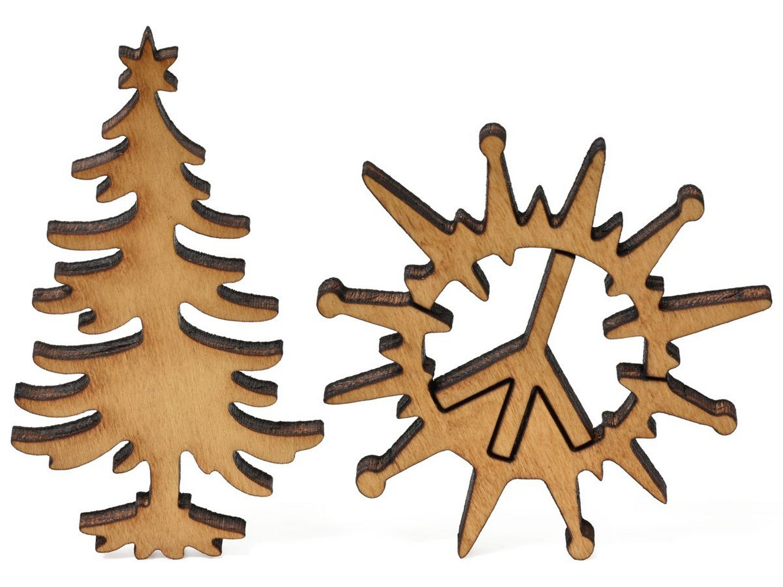 A closeup of pieces that show a Christmas Tree and a peace sign.