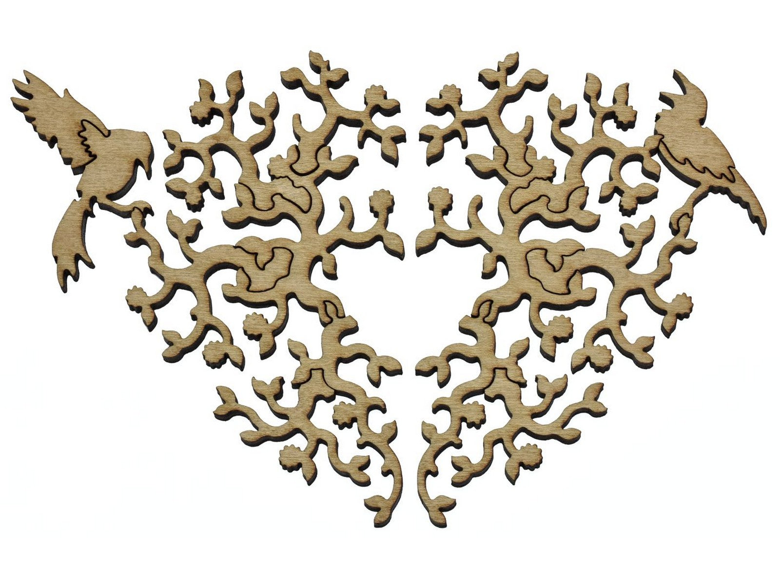A closeup of pieces that form a heart made out of vines and two birds.