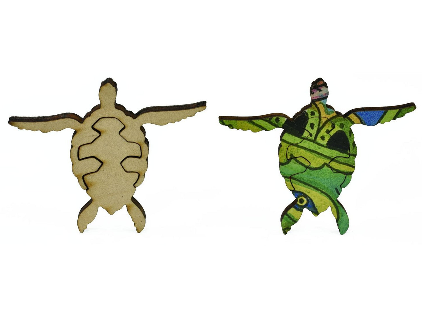 A closeup of pieces in the shape of an additional two sea turtles.
