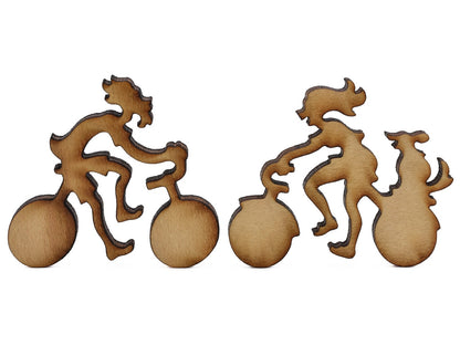 A closeup of pieces shaped like two people on bicycles.