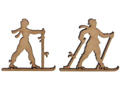 A closeup of pieces shaped like two cross country skiers.