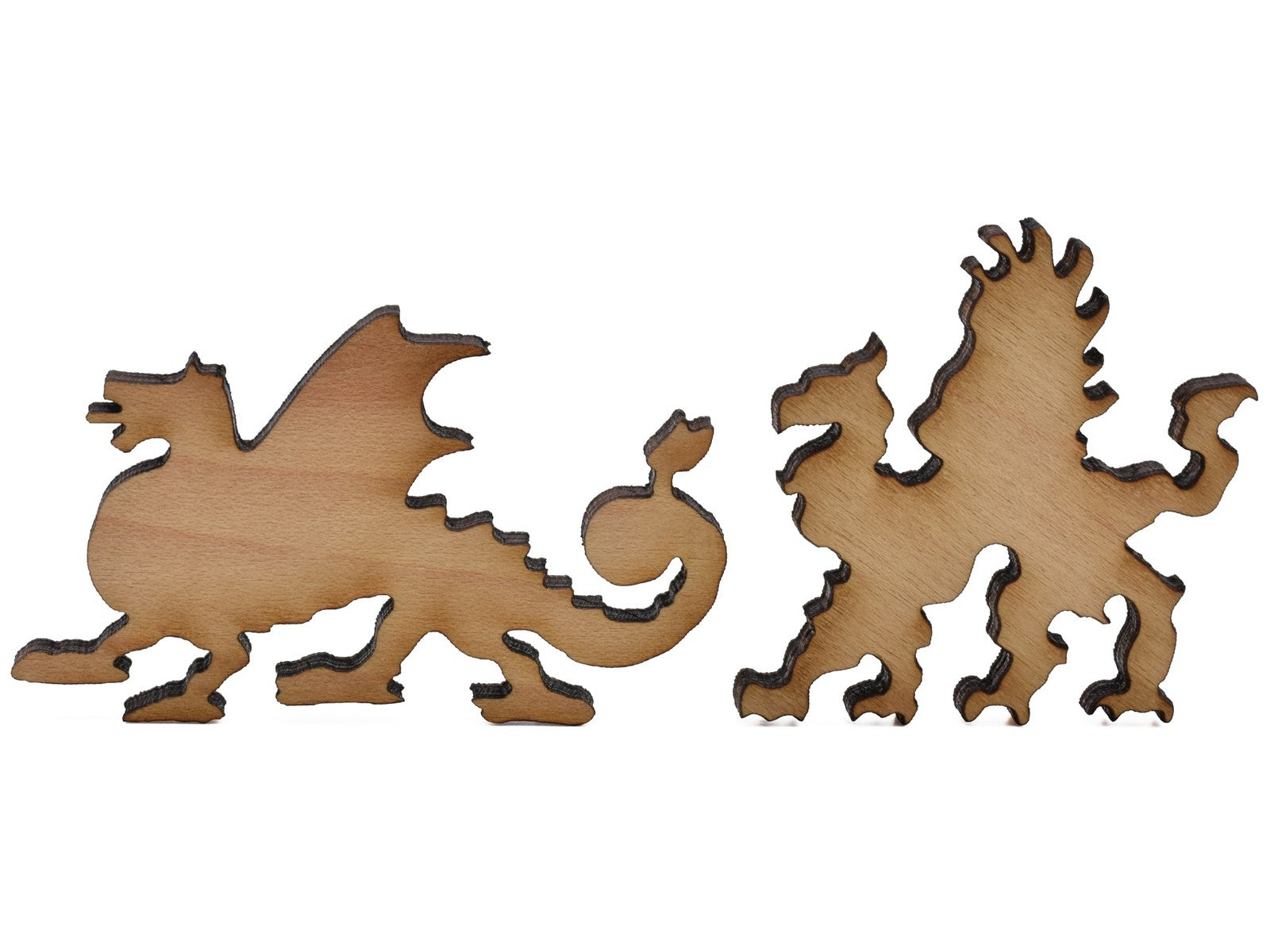 A closeup of pieces shaped like two dragons.