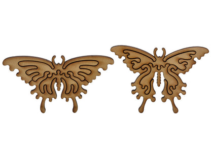 A closeup of pieces shaped like two large butterfies.