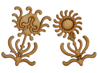 A closeup of pieces shaped like two large flowers.