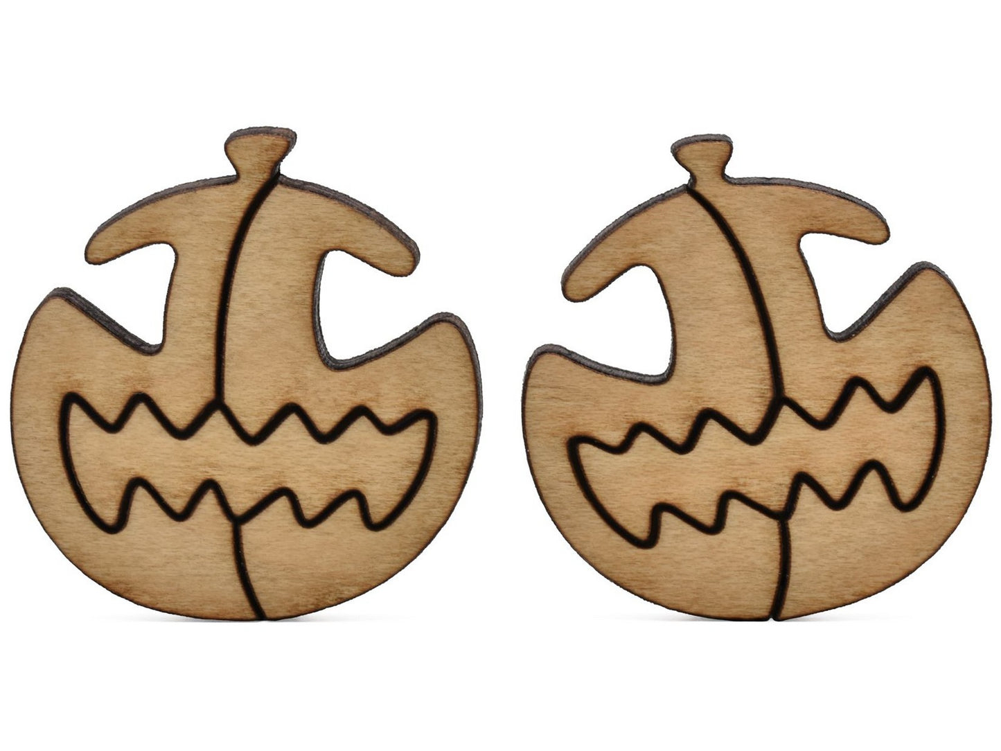 A closeup of pieces shaped like two multi-piece pumpkins.