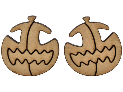 A closeup of pieces shaped like two multi-piece pumpkins.