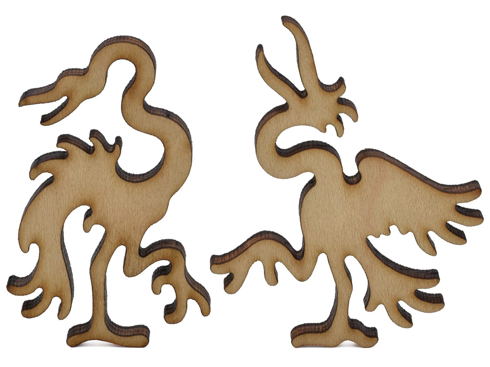 A closeup of two more pieces shaped like two large birds.