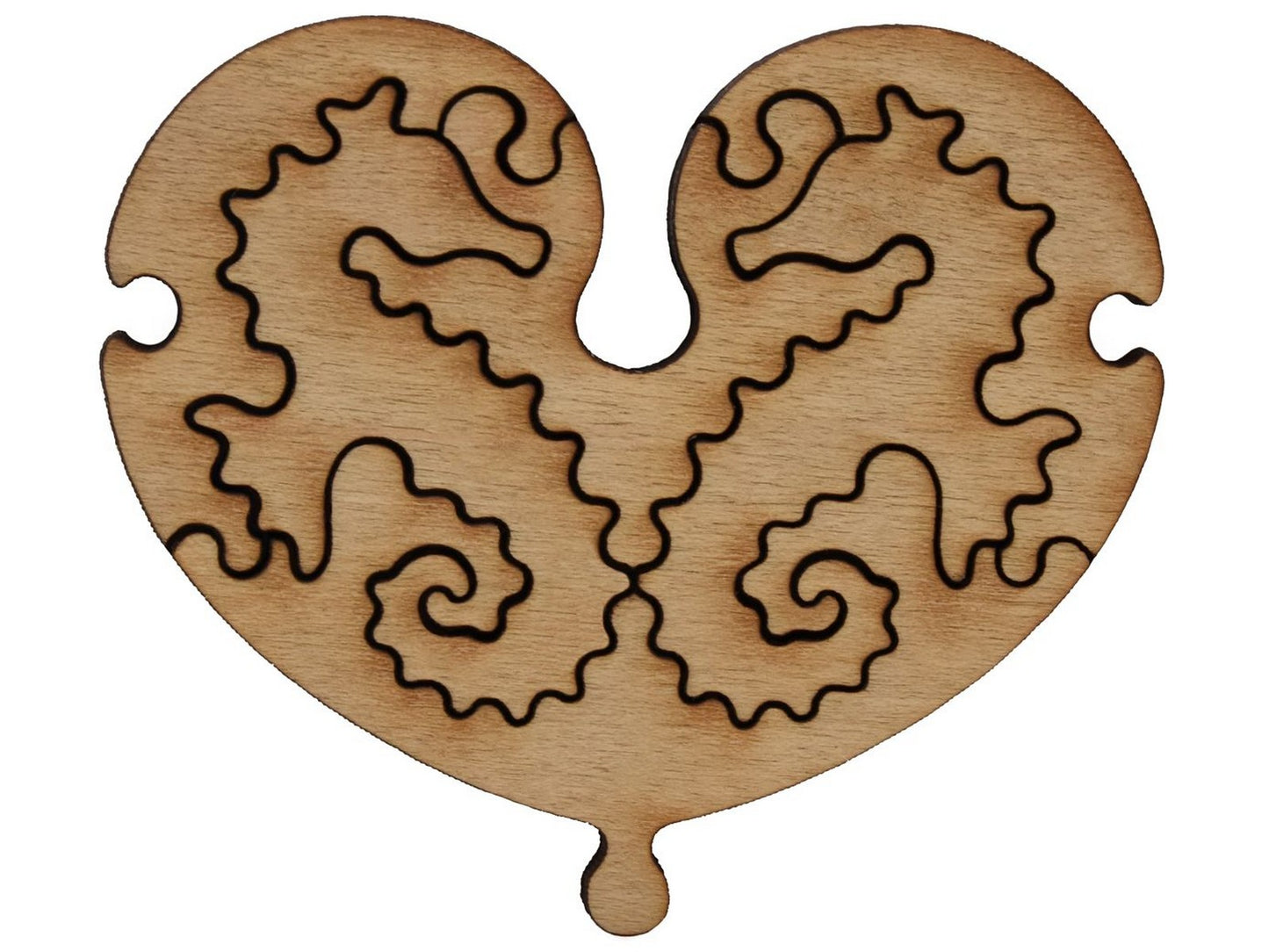 A closeup of pieces shaped like two seahorses in a heart.