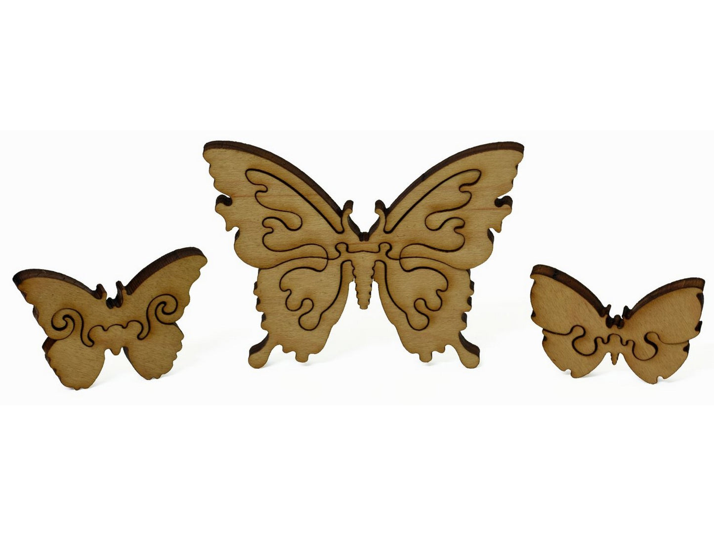 A closeup of pieces showing a big butterfly and two smaller ones.