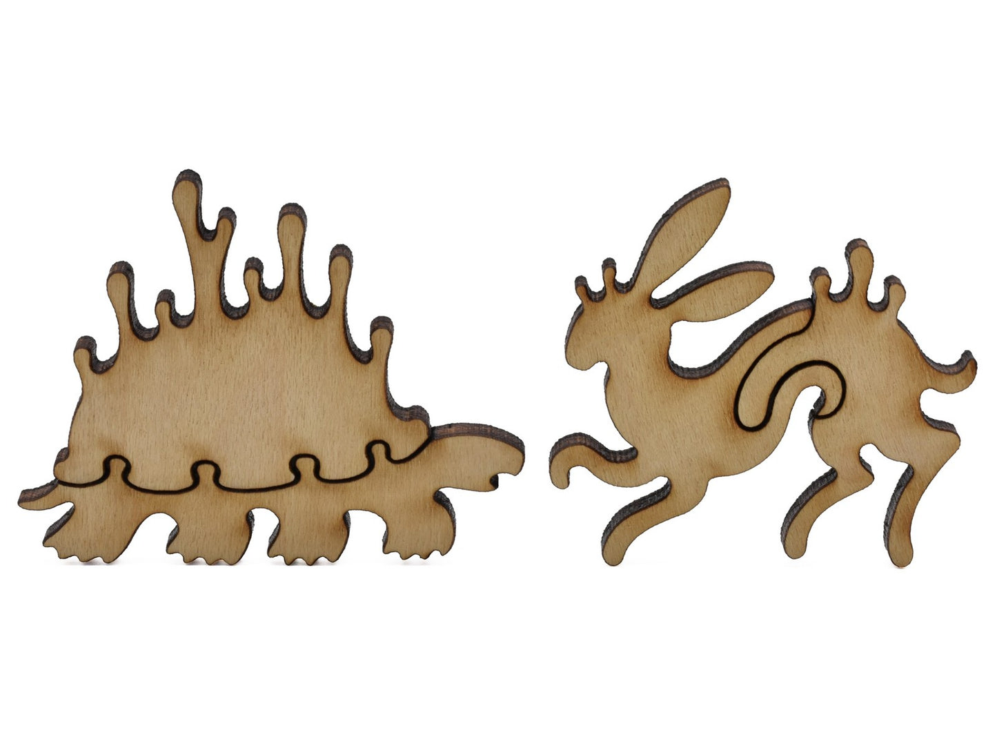 A closeup of pieces shaped like a whimsical turtle and rabbit.