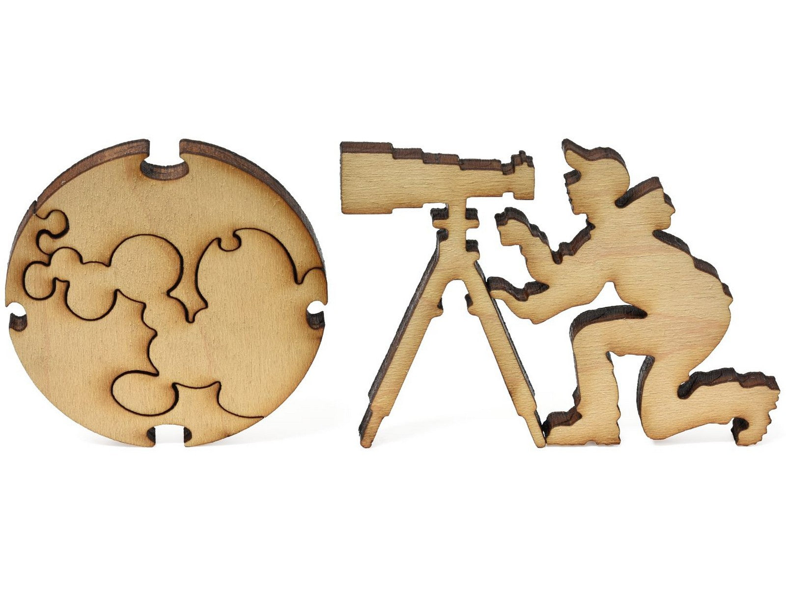 A closeup of pieces showing an astronomer with a telescope and a planet.