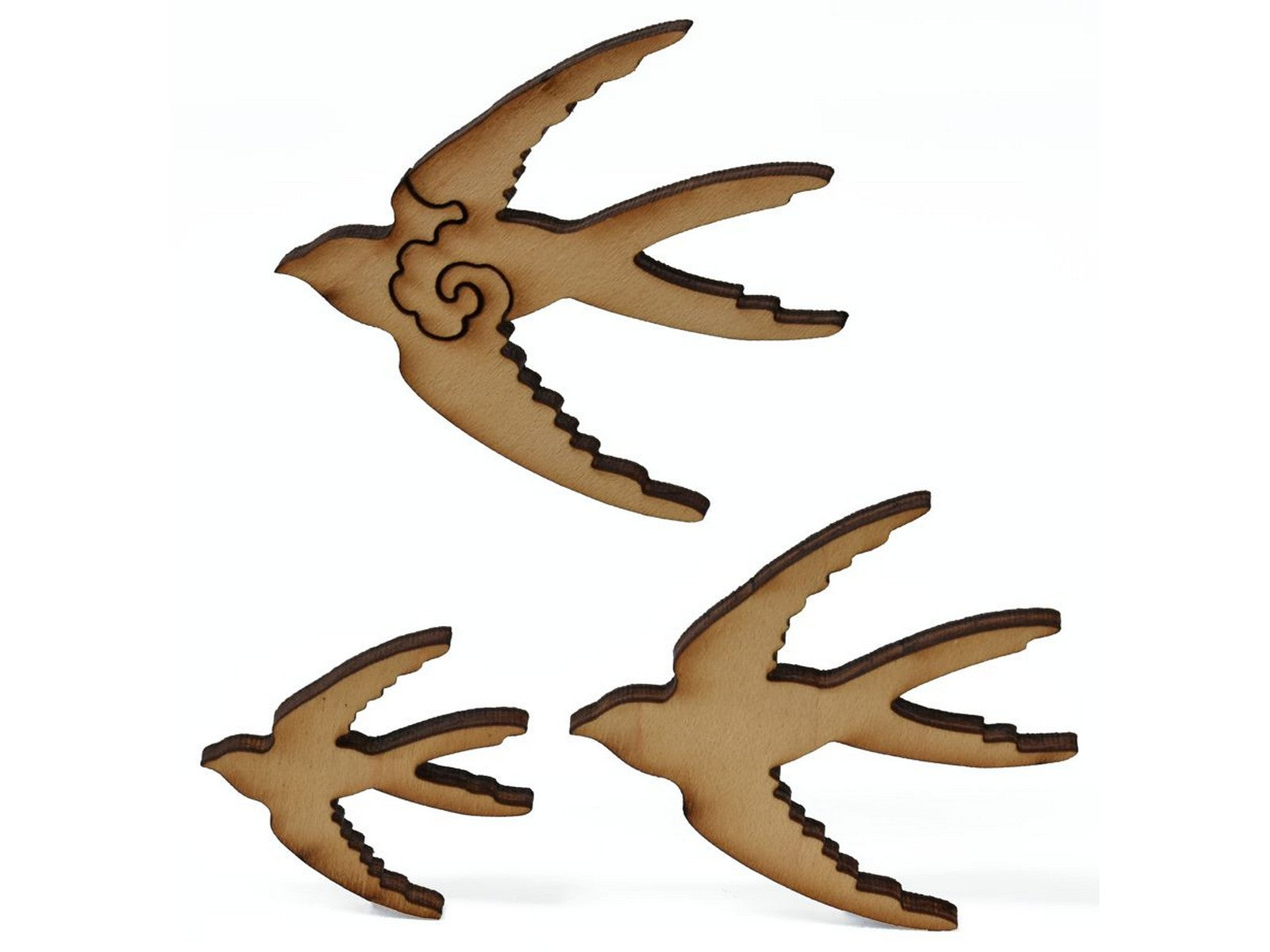A closeup of pieces showing three birds in flight.