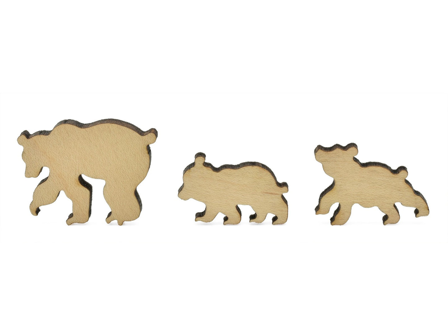 A closeup of pieces in the shape of three bears.