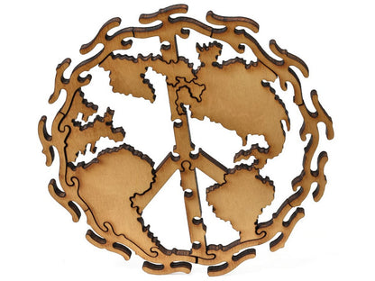 A closeup of pieces that show a peace sign in a world map.