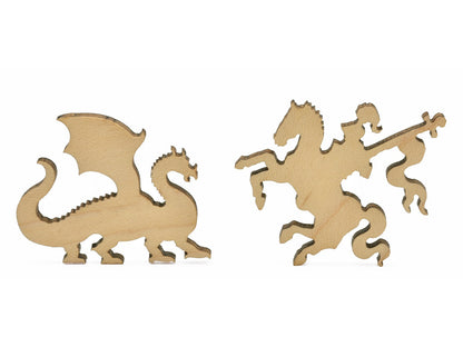 A closeup of pieces in the shape of a knight fighting a dragon.