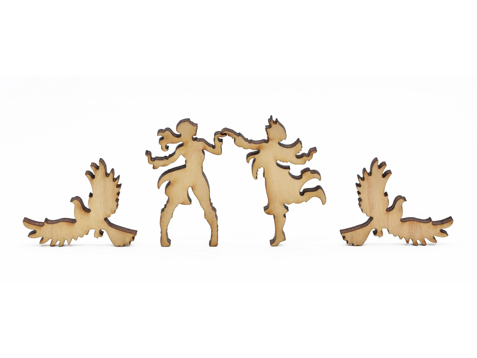 A closeup of pieces in the shape of a couple dancing and birds flying.