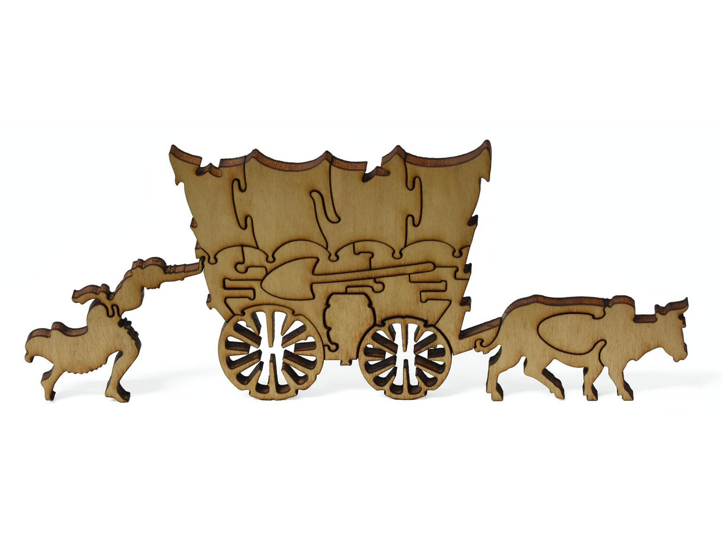 A closeup of pieces showing an oxen and Conestoga wagon.