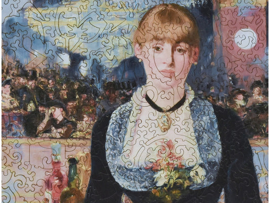 A closeup of the front of the puzzle, A Bar at the Folies-Bergère, showing the detail in the pieces.