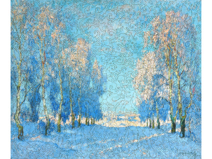 The front of the puzzle, A Winter's Day, with trees along a snowy road.