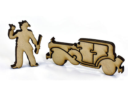 A closeup of pieces in the shape of a gangster and a vintage car.