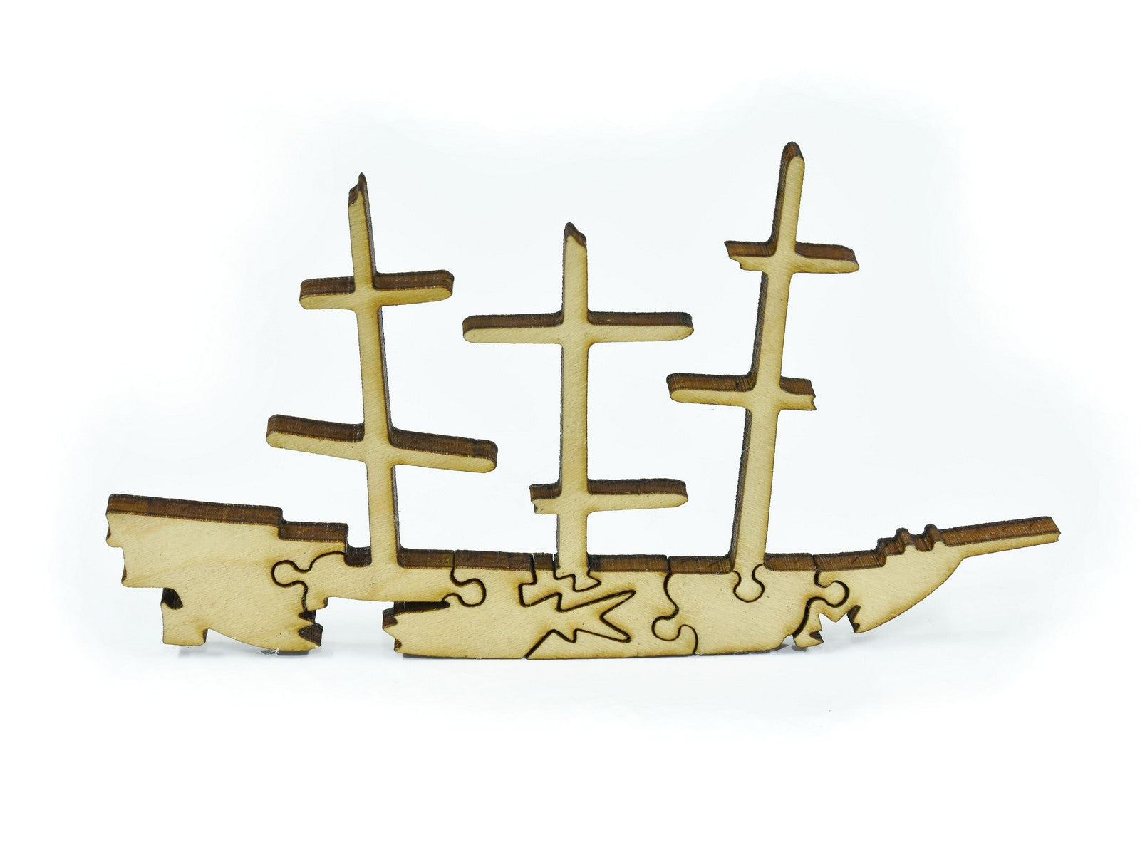 A closeup of pieces in the shape of a shipwreck.