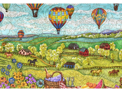 A closeup of the front of the puzzle, Balloons Over Farmland, showing the detail in the pieces.