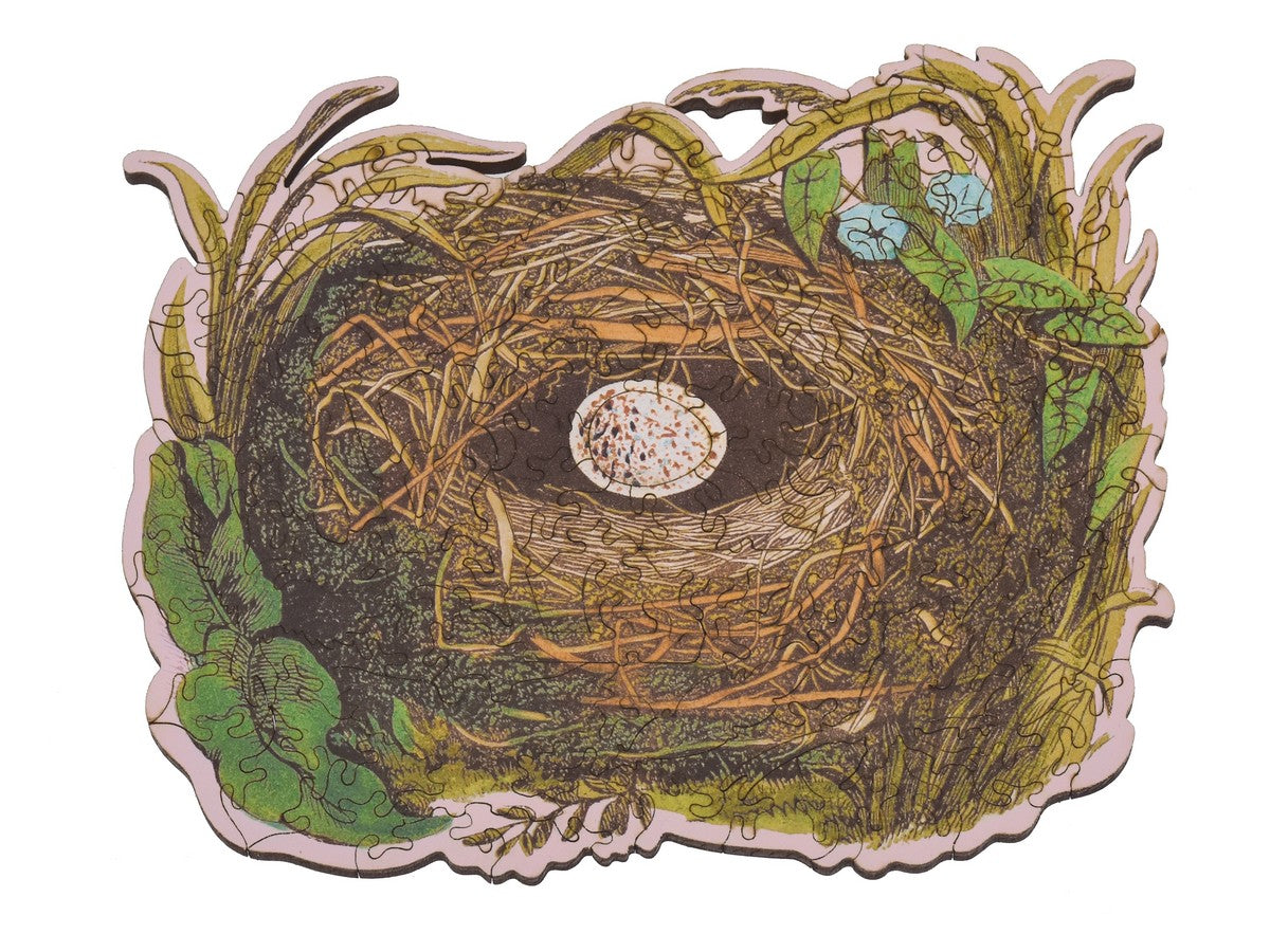 The front of the puzzle, Bird's Nest, with an irregular border shaped like a bird's nest.