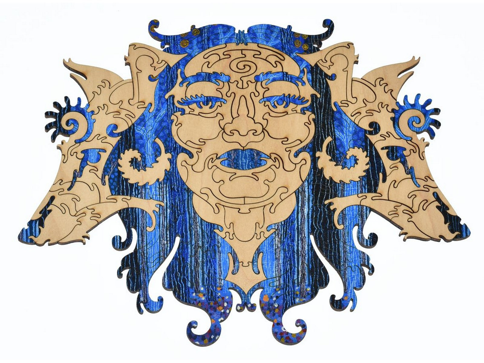 A closeup of pieces showing an alternative solution to the puzzle, Blue Forest, in the shape of a woman and wolves.