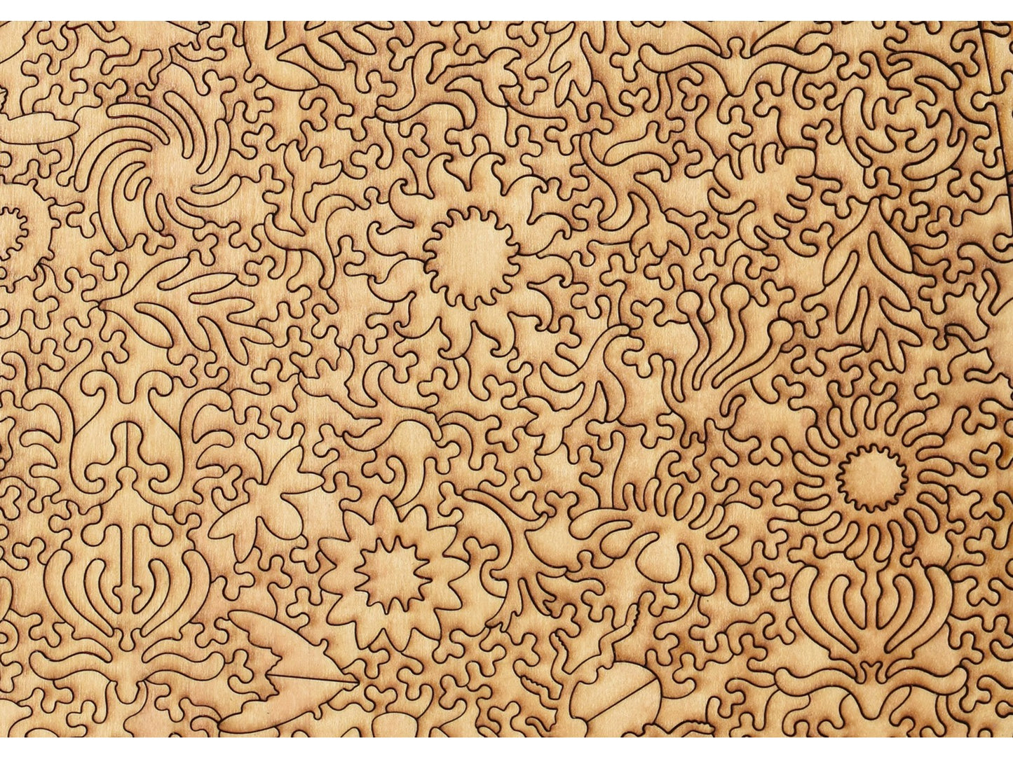 A closeup of the back of the puzzle, Bug Garden Terrarium, showing the detail in the pieces.