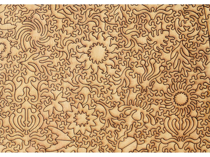 A closeup of the back of the puzzle, Bug Garden Terrarium, showing the detail in the pieces.