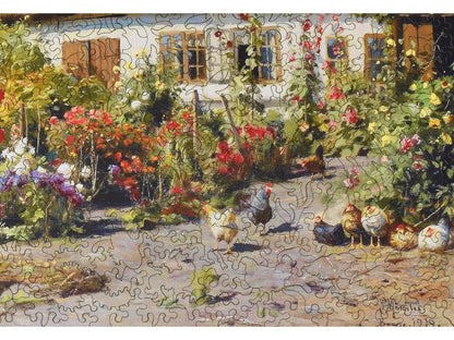 A closeup of the front of the puzzle, A Cottage Garden with Chickens, showing the detail in the pieces.