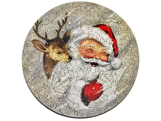 The front of the small round puzzle, Deerful Santa, with Santa and a reindeer.