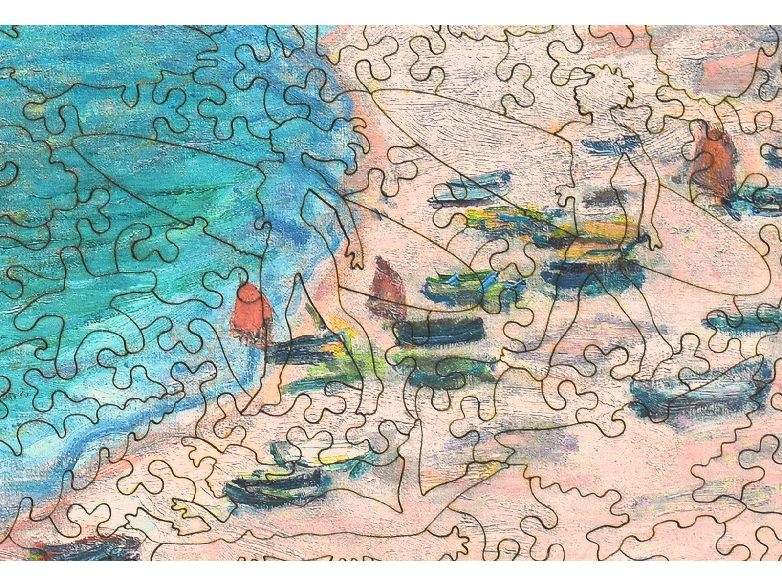 A closeup of the front of the puzzle, Étretat: The Beach and the Falaise d'Amont, showing the detail in the pieces.