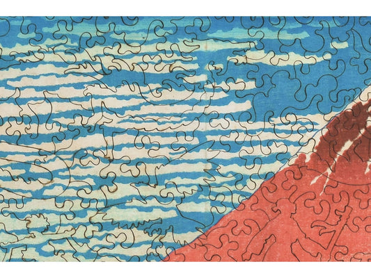 A closeup of the front of the puzzle, Fine Wind, Clear Morning, showing the detail in the pieces.
