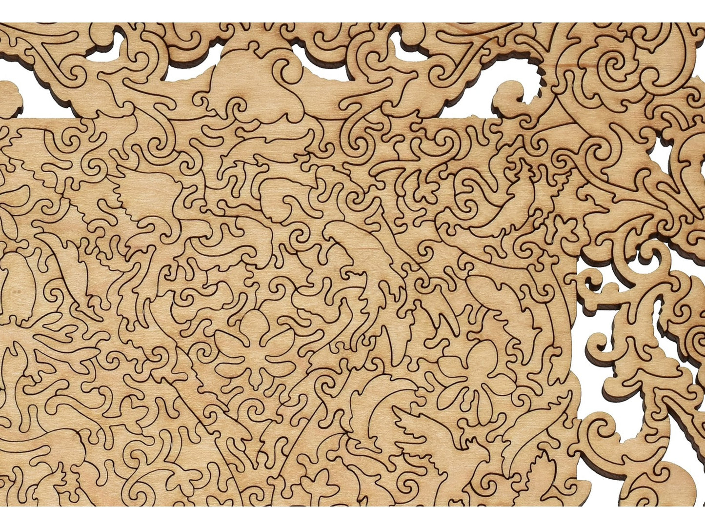 A closeup of the back of the puzzle, Flourish, showing the detail in the pieces.