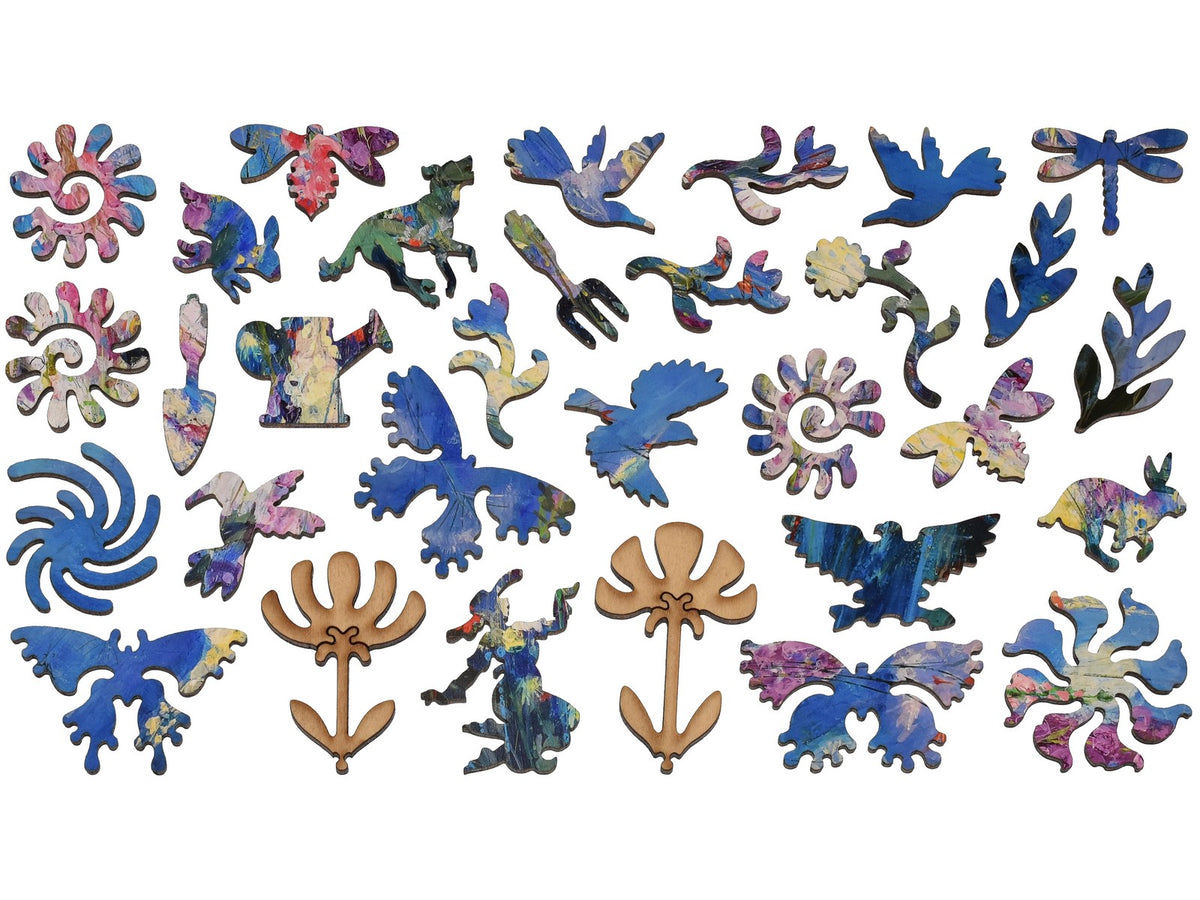 The whimsy pieces that can be found in the puzzle, Foxgloves and Alliums.