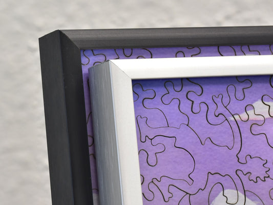 A closeup of the black and silver frames where color and texture are visible.