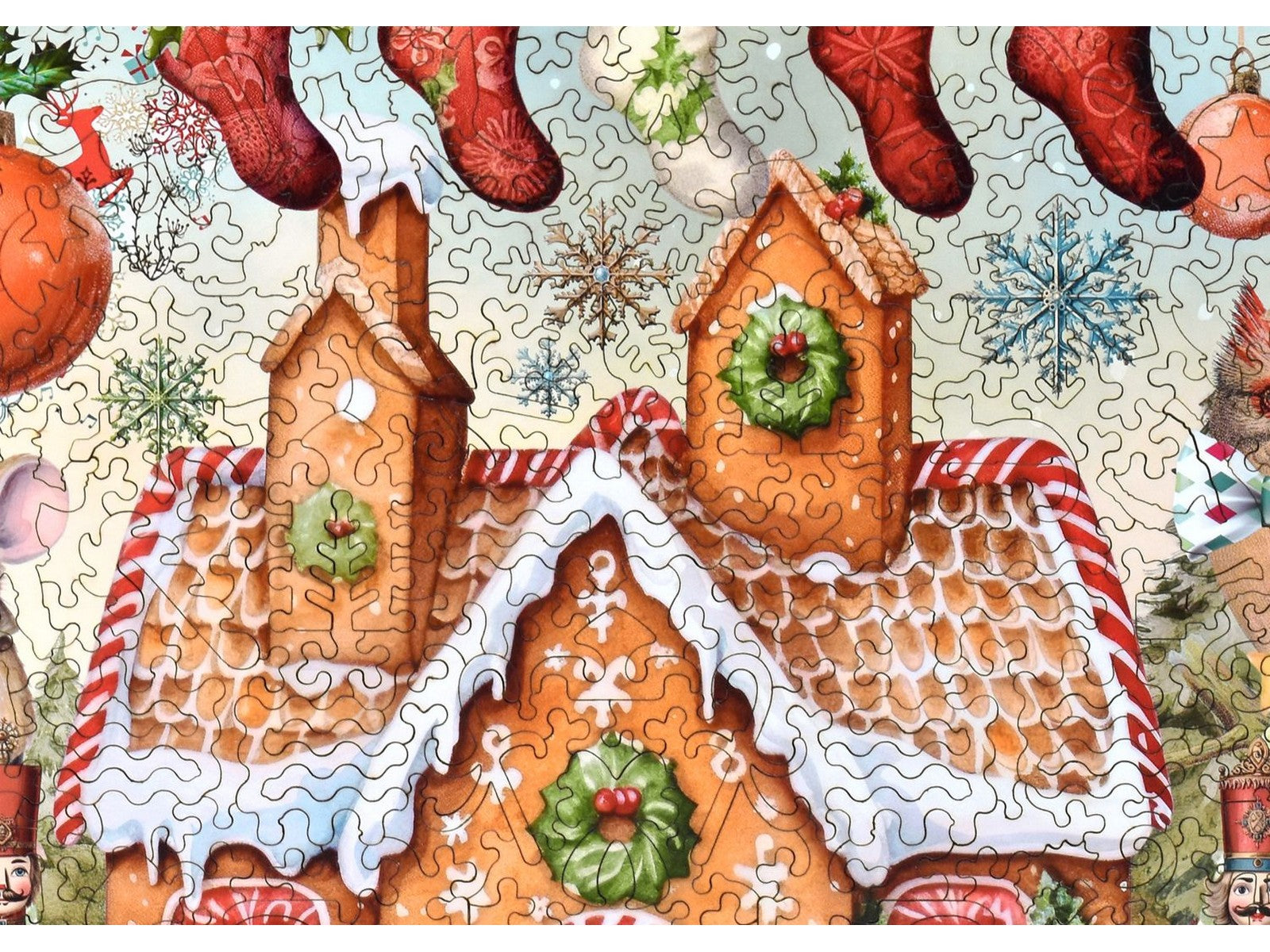 A closeup of the front of the puzzle, Holly Jolly Christmas, showing the detail in the pieces.