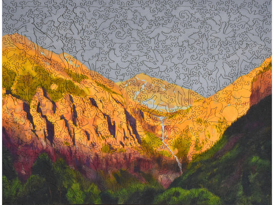 The front of the puzzle showing the Bridal Veil Falls waterfall in Telluride, Colorado.