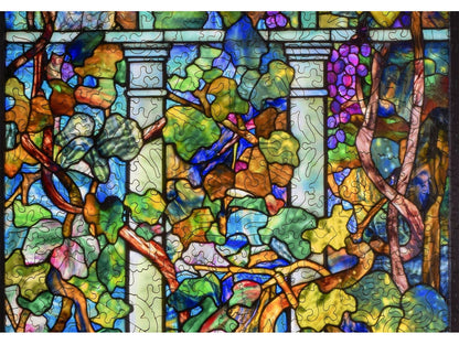 A closeup of the front of the puzzle, Lemon Tree and Grape Vine with Trellis Window, showing the detail in the pieces.