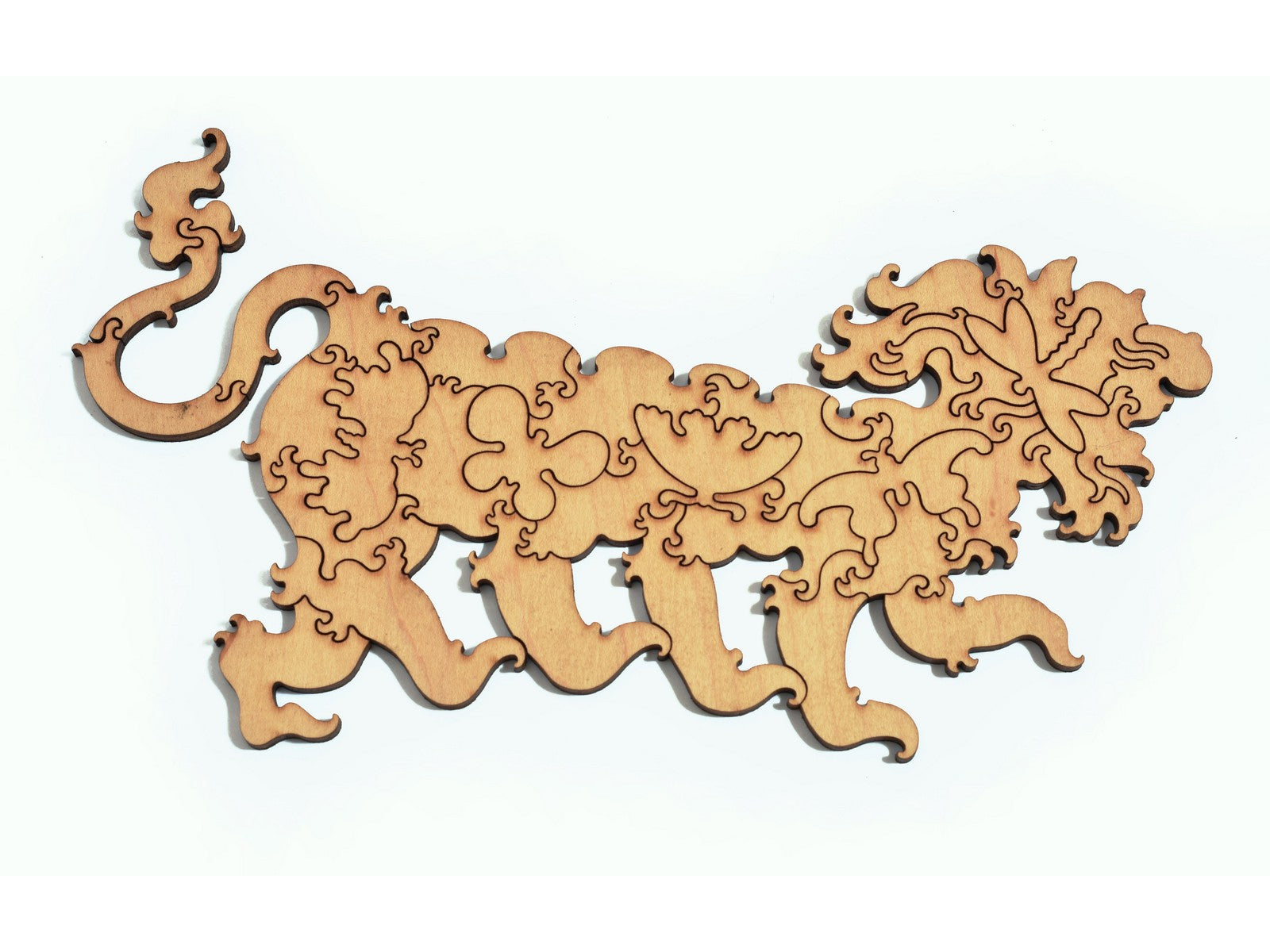 A closeup of pieces in the shape of a lion.