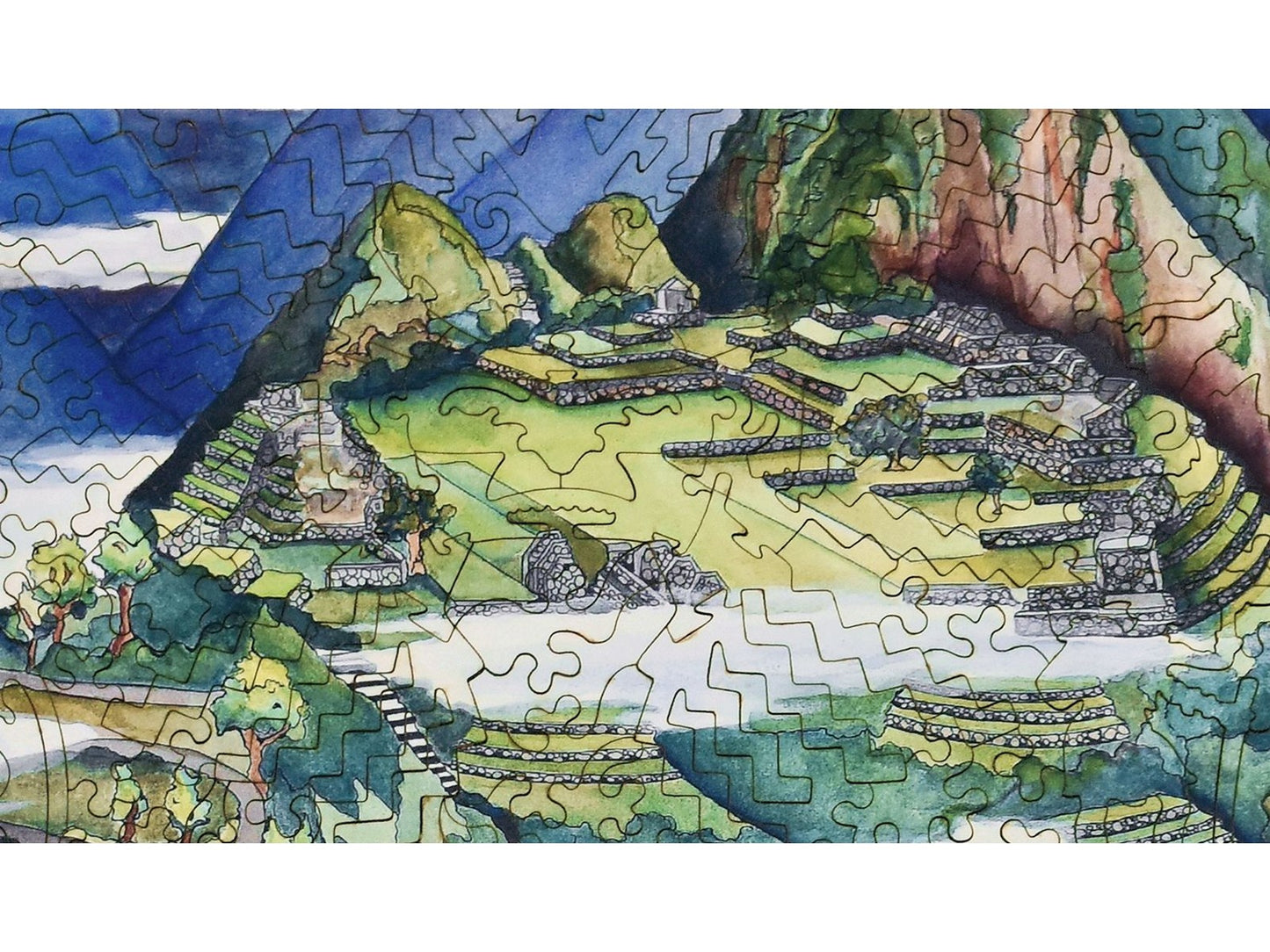 A closeup of the front of the puzzle, Machu Picchu, showing the detail in the pieces.