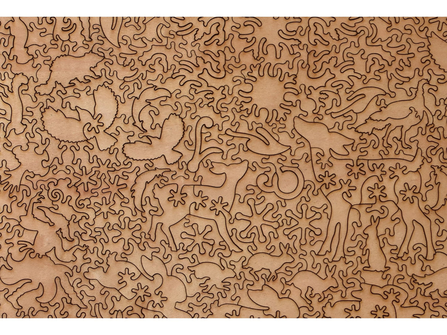 A closeup of the back of the puzzle, Magical Winter Woodland, showing the detail in the pieces.