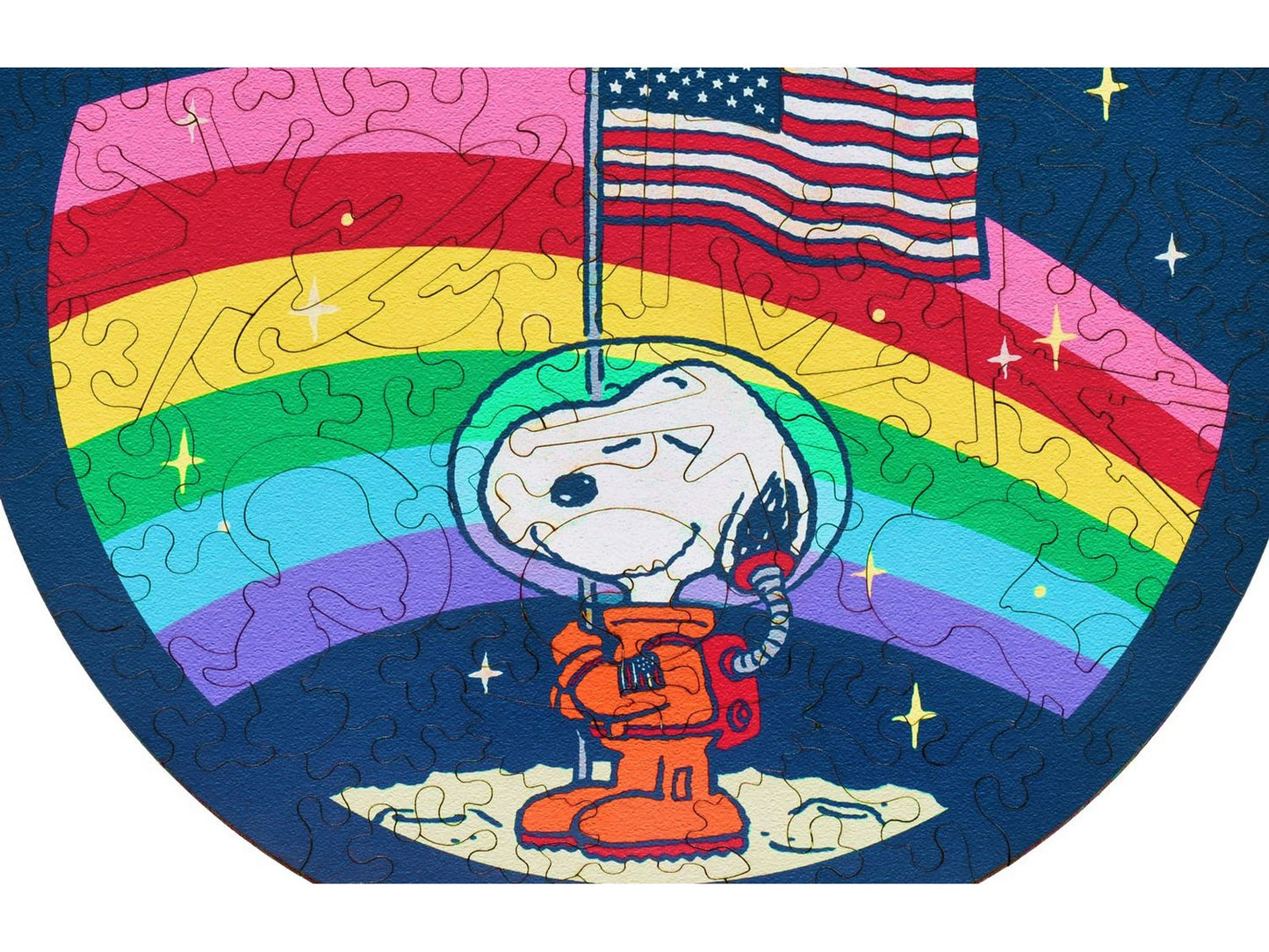 A closeup of the front of the puzzle, One Small Step for Snoopy, showing the detail in the pieces.