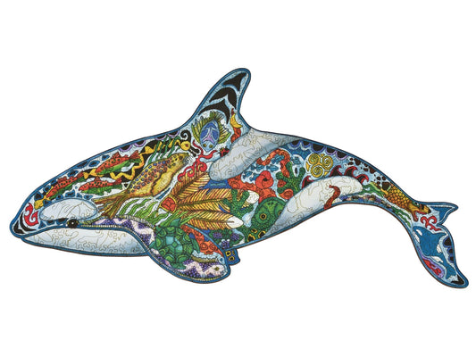 The front of the puzzle, Orca, which shows various sea creatures and plants in the shape of an orca. 